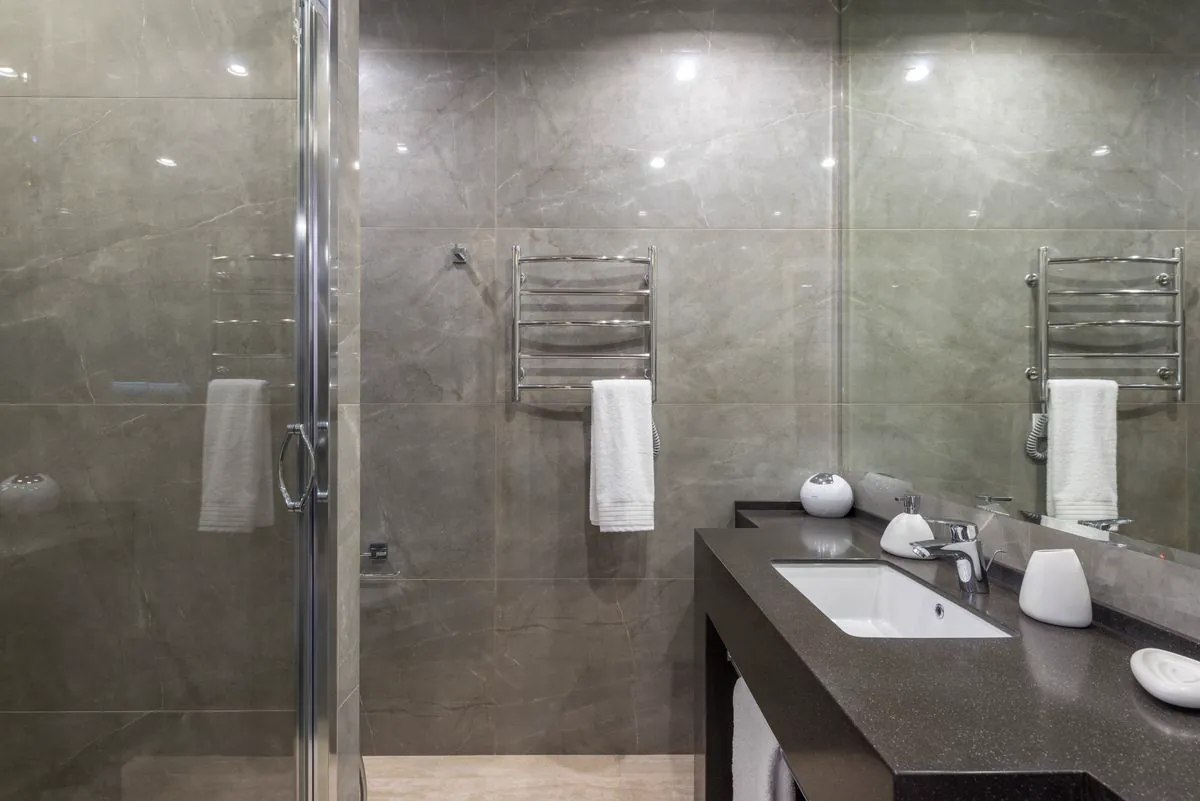 Concrete-look panels and matte black hardware