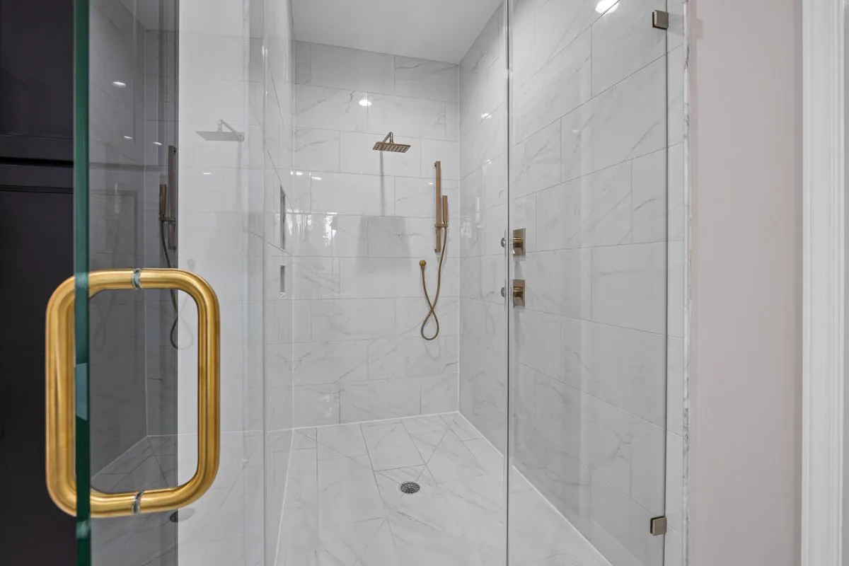 Glass shower enclosure