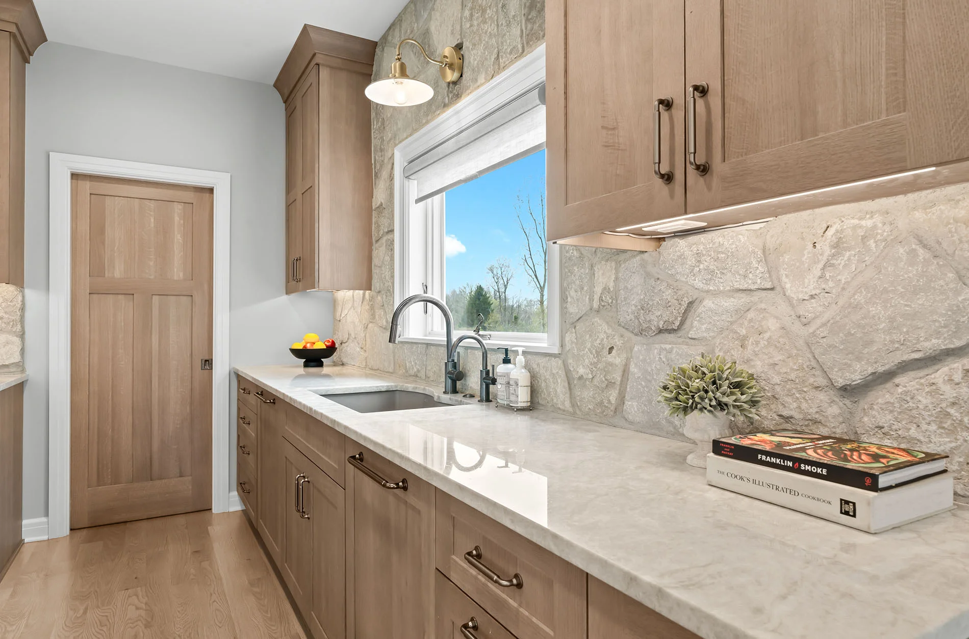 Expansive island in cherry stained Chestnut with quartzite top