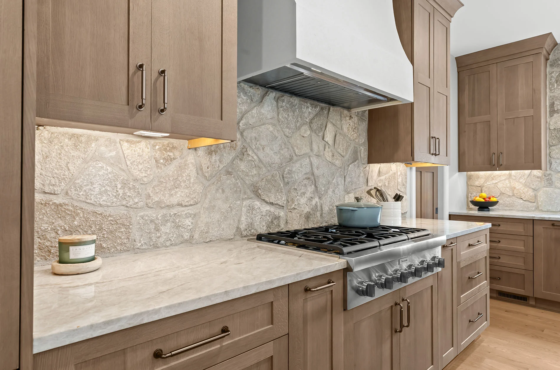 Painted perimeter cabinetry with inset Shaker doors