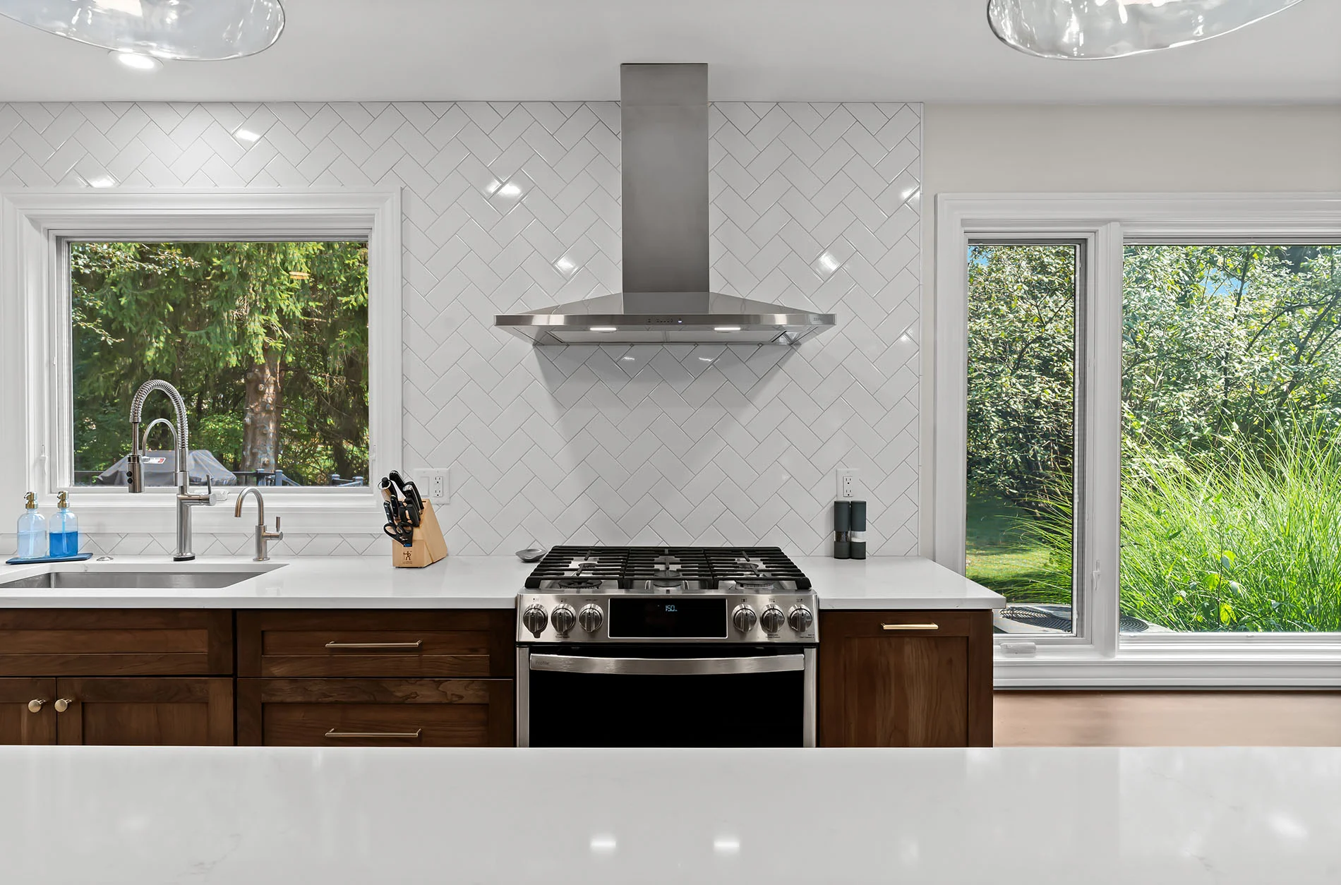 Paneled refrigerator integrated into cherry cabinetry