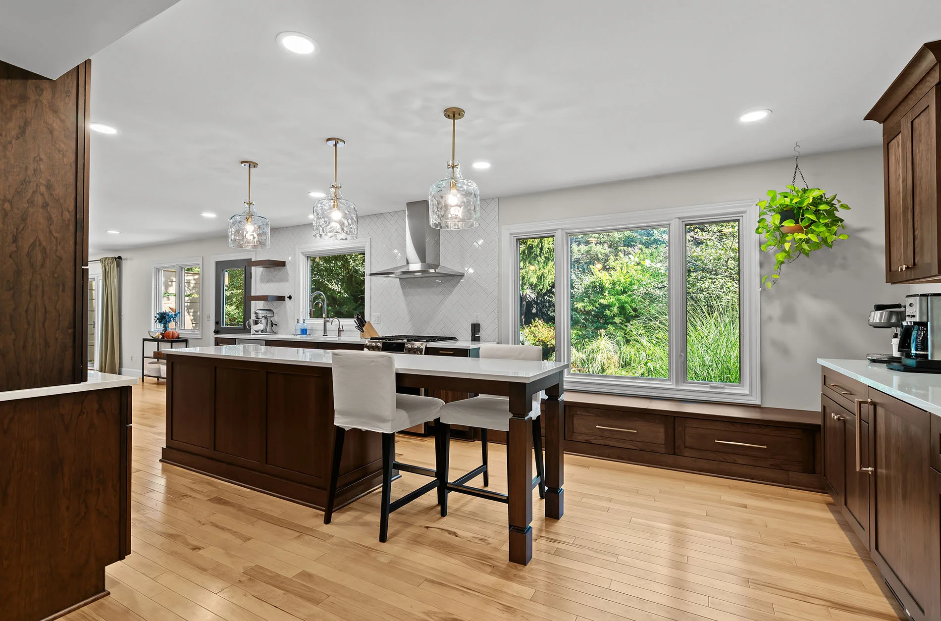 Open layout connecting kitchen to adjacent living spaces